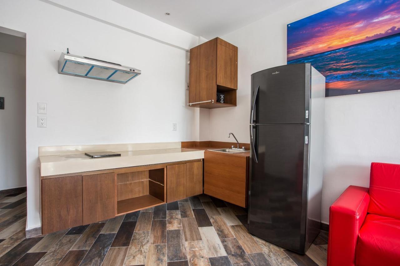 Capital O Cancun Ocean View, Cancún Zewnętrze zdjęcie A typical kitchen in a studio apartment